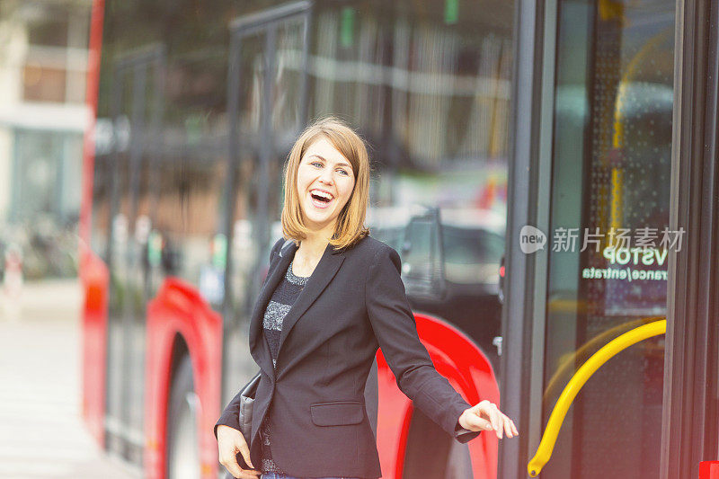 Young woman on the bus station